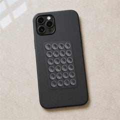 Silicone suction phone holder mounted on a phone case